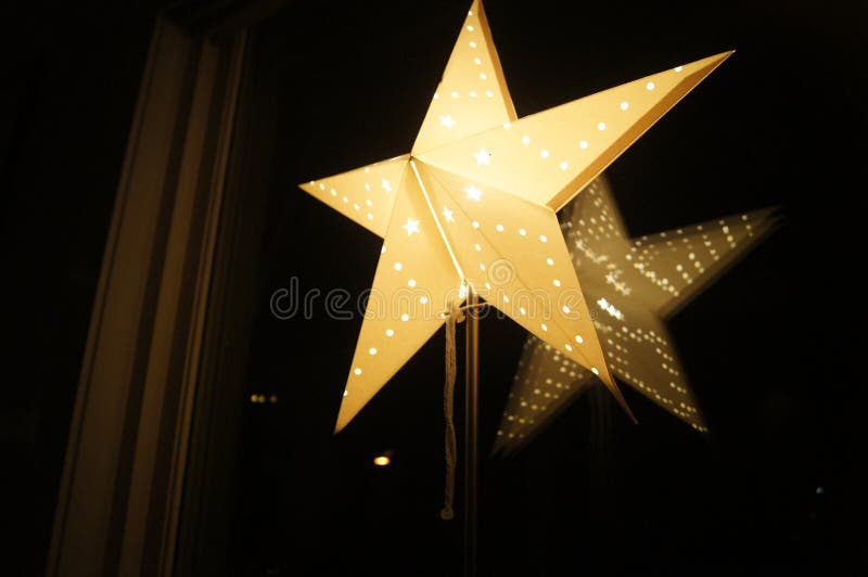 A Shining Christmas Star in a Window Stock Image Image of star