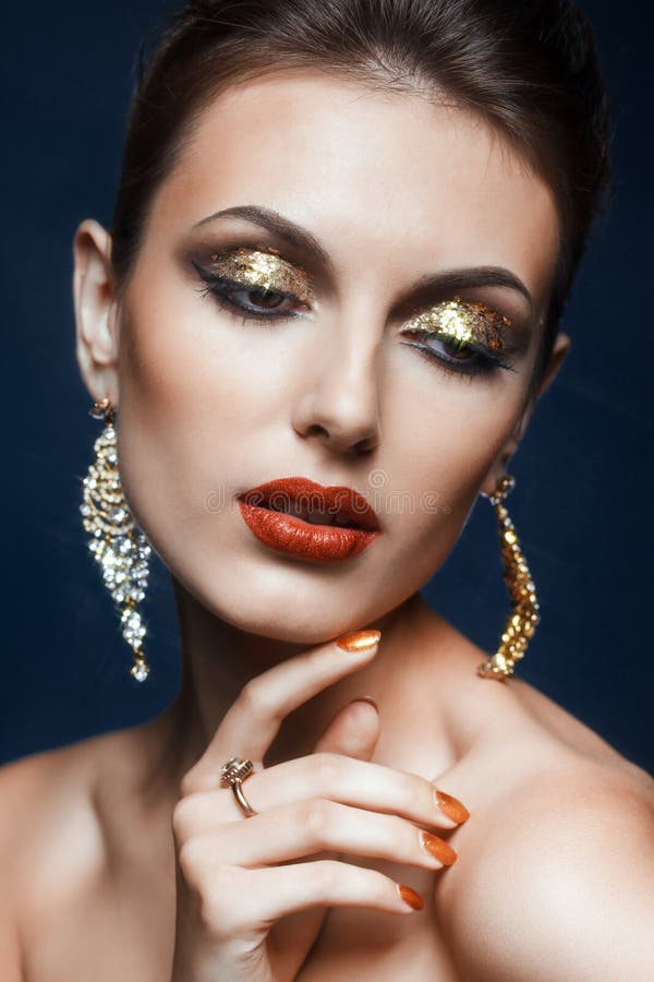 Shining face makeup stock photo. Image of gorgeous, earring - 43940588