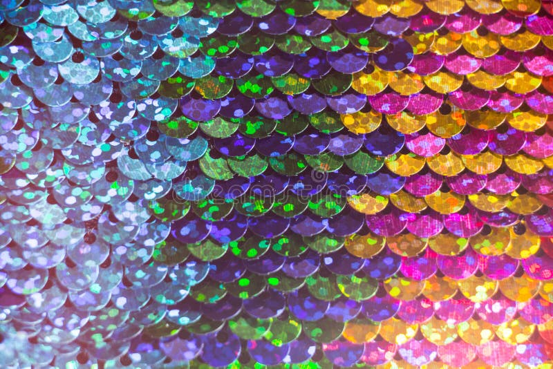 Shiny colorful sequin dress detail texture.