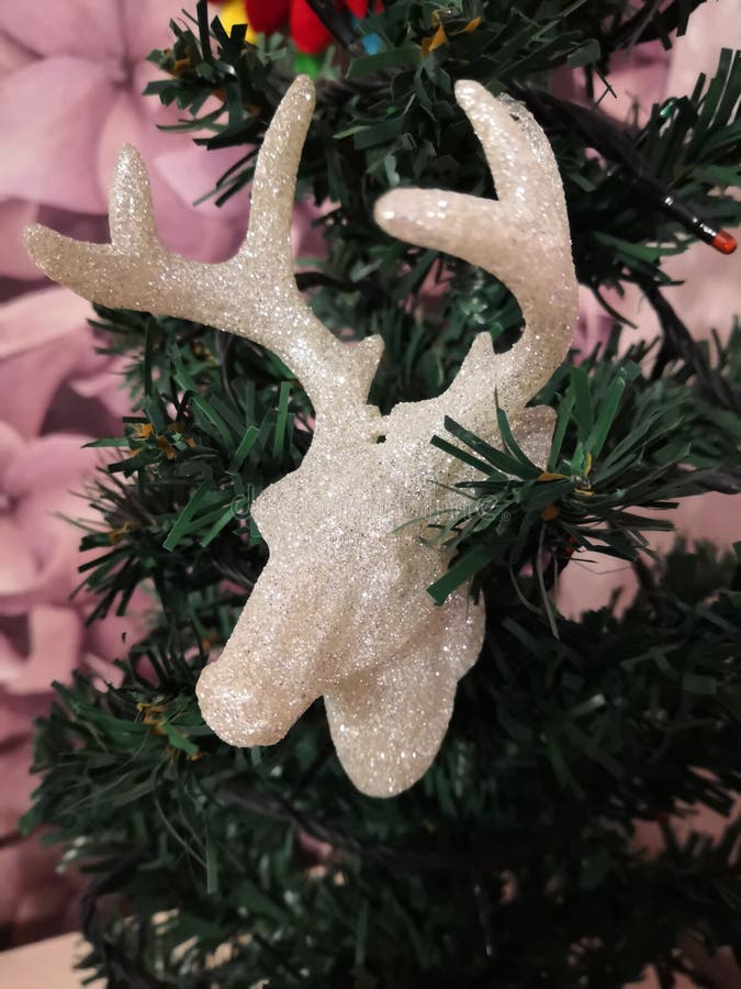 Shiny Deer Head on a Christmas Tree Stock Photo Image of shiny