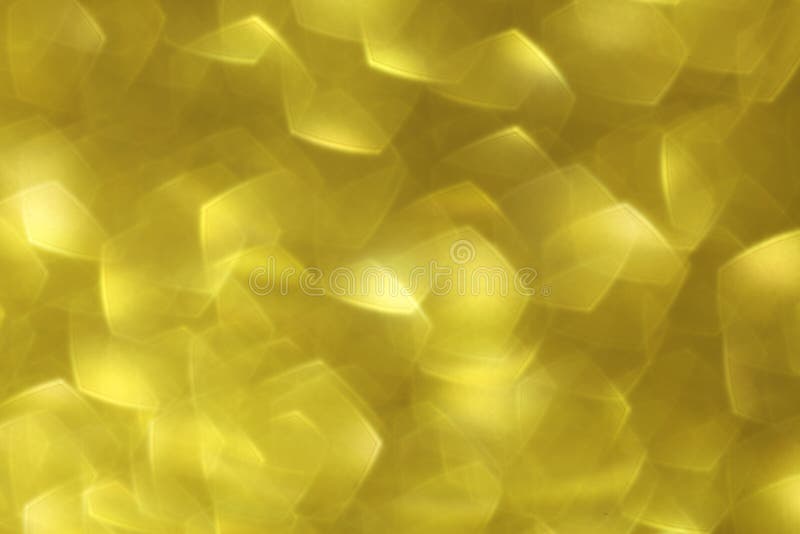 Shiny gold abstract background with a bokeh effect