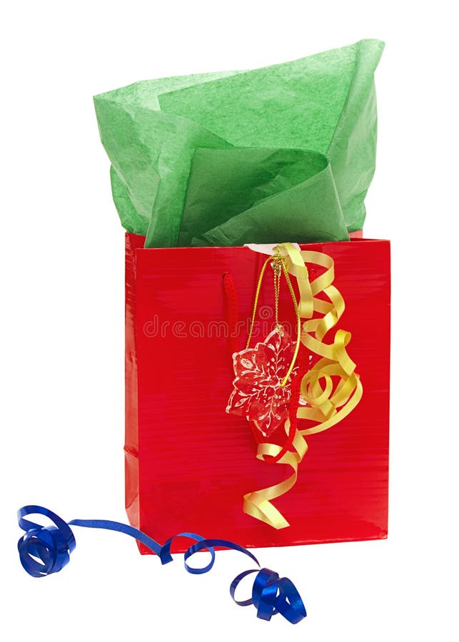 Red Christmas Gift Bag With Tissue Paper Isolated On White