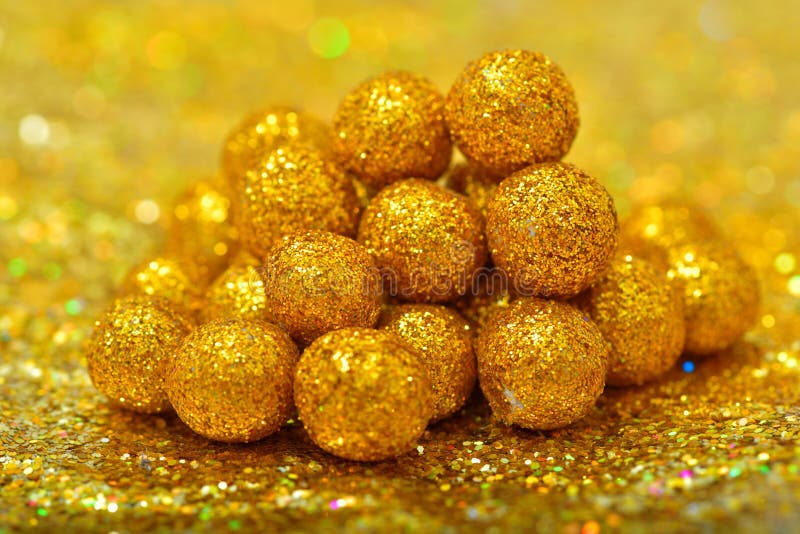 Shiny Sphere Made of Golden Glitters with Sparkles and Glares Stock