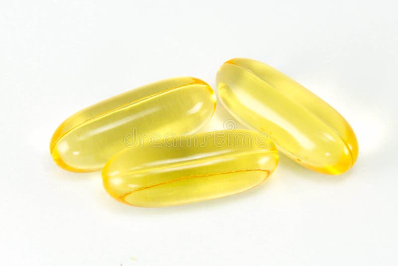 Yellow Vitamin Pill Oil Capsule Macro Isolated Stock Photo Image of alternative, macro 8609556