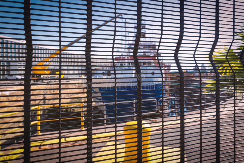Ship in a dry dock behind the fence in Cape Town stock images Ship in a dry dock behind the fence in Cape Town stock images