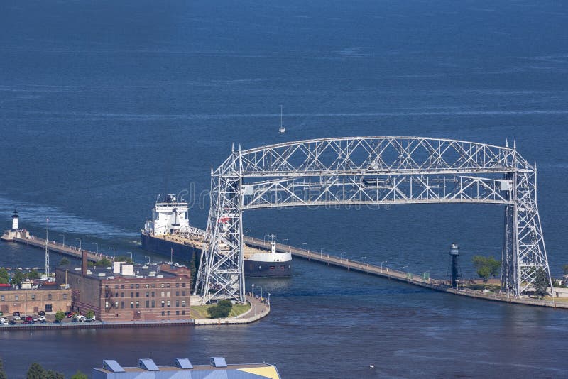 A Ship Entering Duluth Harbor Stock Photo Image of pier, landscape