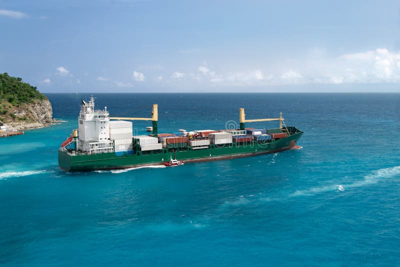 Ship leaving tropical port stock photo. Image of bright 21284024