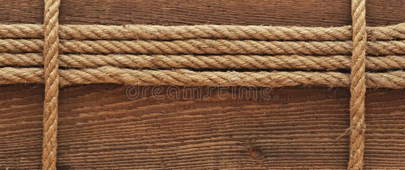 Ship rope and old wood background