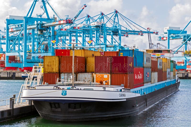 Shipping container barge at the Maasvlakte 2 harbor in the Port of Rotterdam. September 8, 2019 stock images Shipping container barge at the Maasvlakte 2 harbor in the Port of Rotterdam. September 8, 2019 stock images