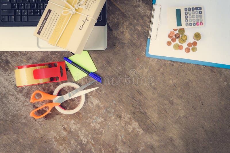 Shipping laptop selling things online ecommerce delivery shopping online and order concept calculator money coin notes paper royalty free stock photos Shipping laptop selling things online ecommerce delivery shopping online and order concept calculator money coin notes paper royalty free stock photos