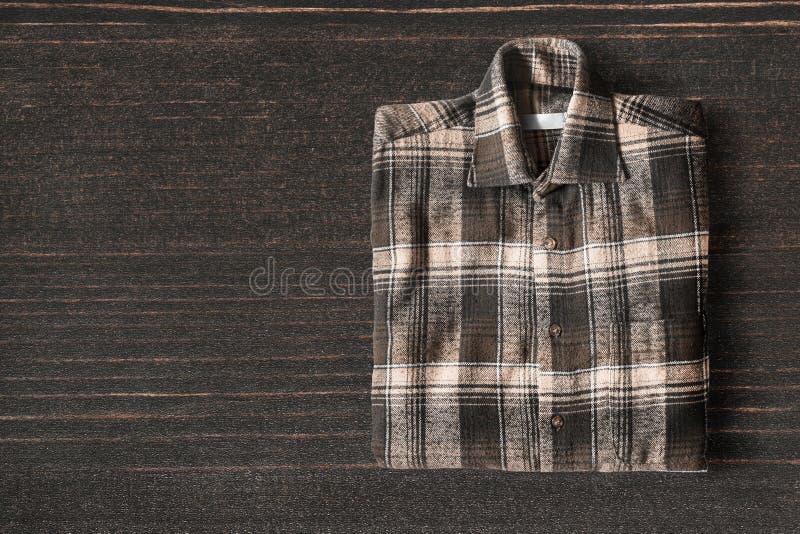 Shirt on wooden background stock photo. Image of planks - 84275434