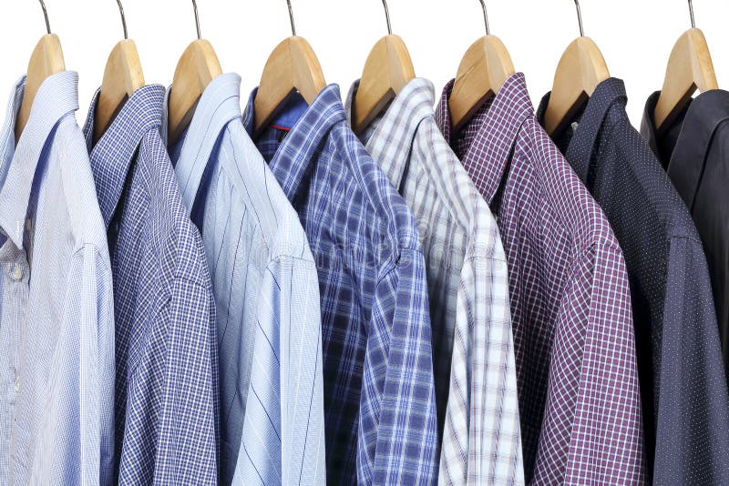 Shirts on hangers stock photo. Image of blue, clothing - 139321236