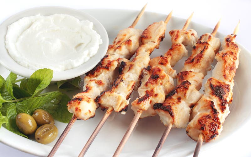 Shish taouk - Chicken shish kebab on white platter