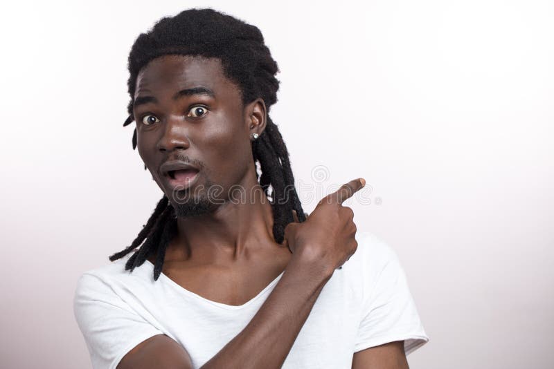 Shocked African American Man Wearing White T-shirt Looking at Camera in ...