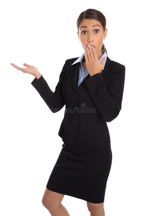 Shocked aisló a la empresaria en el traje que presentaba sobre blanco foto de archivo Shocked aisló a la empresaria en el traje que presentaba sobre blanco foto de archivo