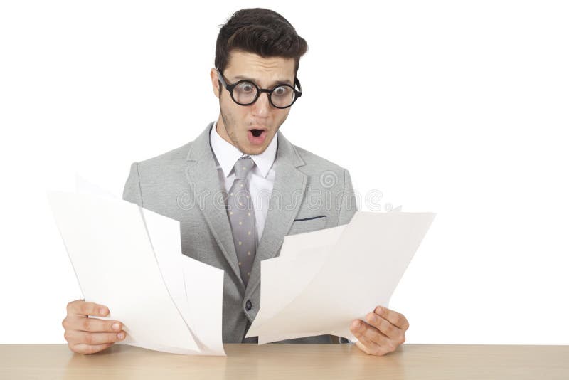 Shocked businessman reading document stock images