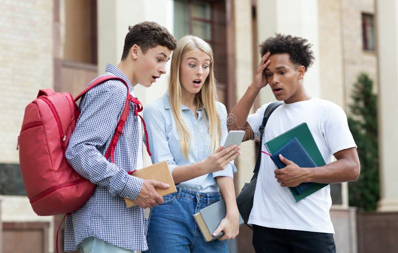 Excellent Marks. Surprised Students Checking Exam Results Stock Photo ...