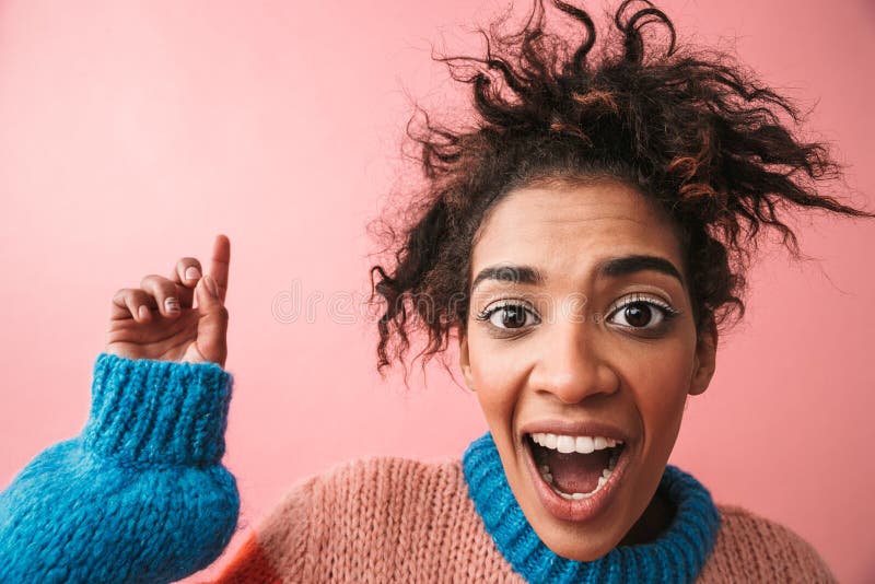 Shocked Emotional Beautiful Young African Woman Posing Isolated Over