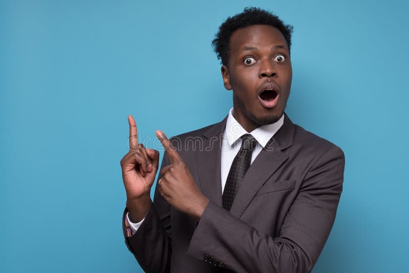 498 Shocked Young Man Pointing Finger Up Stock Photos - Free & Royalty ...