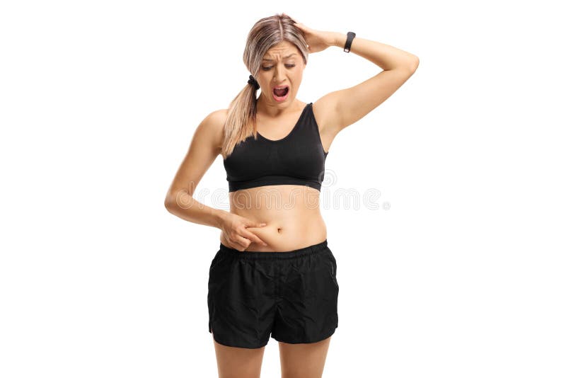 Shocked woman looking at her belly fat