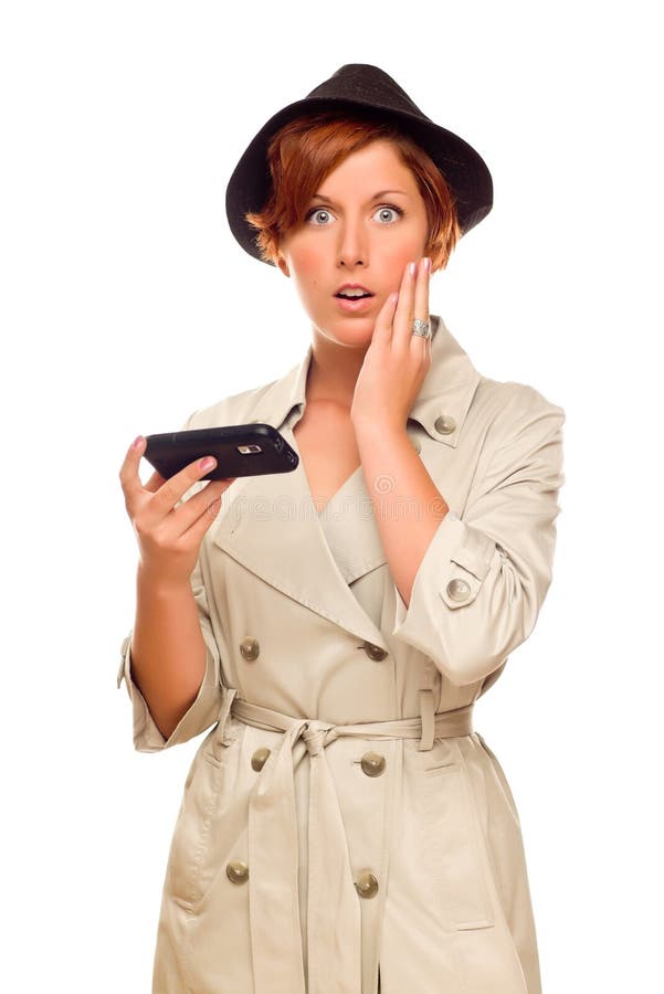 Shocked Young Woman Holding Smart Cell Phone on White stock image