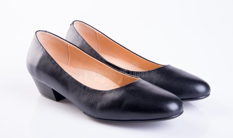 shoe or black color lady shoes on a background.