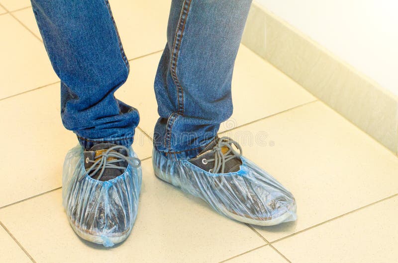 Shoe Covers on Shoes, on the Floor. Stock Photo Image of equipment