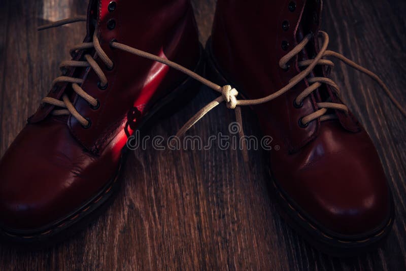 Shoelaces Tied Together On A Blurry Background, Close-up. April Fool`s ...