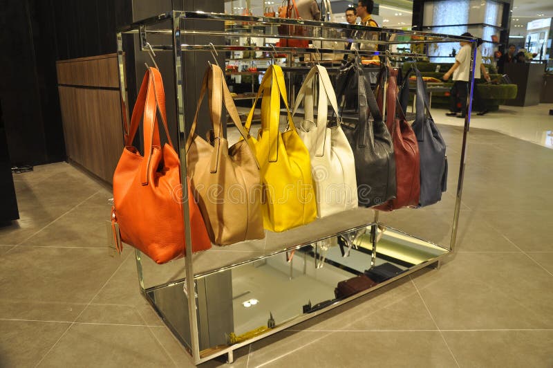 Shoes and bags in store editorial photography. Image of display 56680762