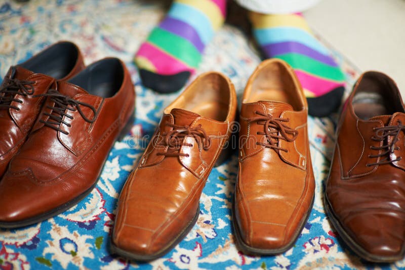 Shoes for Every Occasion. a Man in Colourful Socks Standing Behind 3 ...