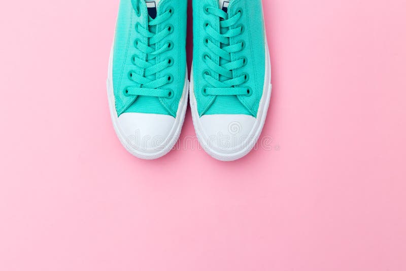 Shoes Green Color for Casual on Pink Background. Copy Space Stock Photo ...
