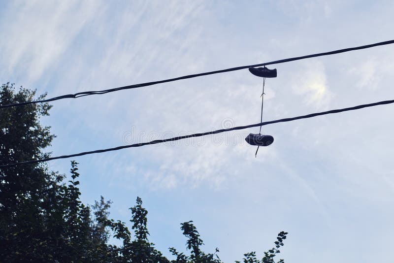 Shoes Hanging on Electric Wires on the Street Stock Photo Image of