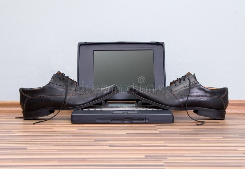 Shoes On Laptop Picture. Image 2534288