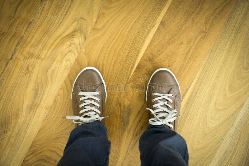 Shoes on Parquet Floor stock photo. Image of dirty, grunge 68296478