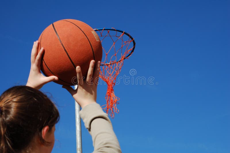 Young Girl Shooting A Goal In Basketball Stock Image Image of person