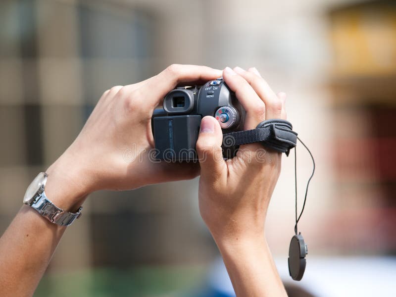 Shooting with a camera stock photo. Image of lens, shooting 10415816