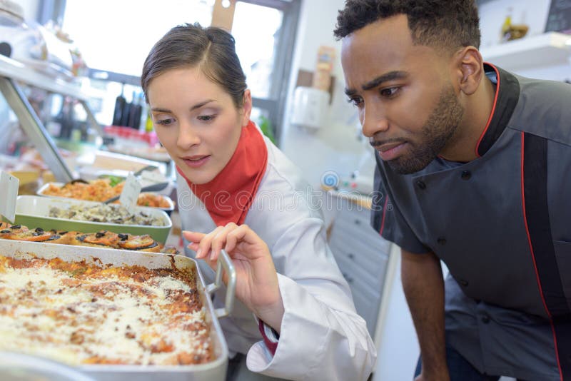 Shopkeeper Working in Grocery Store Stock Photo Image of meat, girl