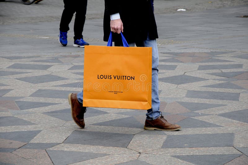 Louis Vuitton Shop With Shoppers Stock Photo - Download Image Now