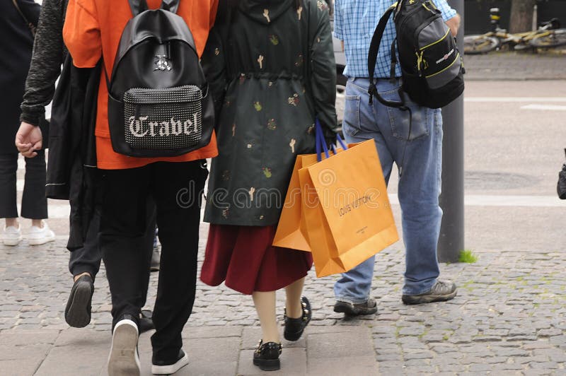 25 May 2023/ Consumers wait at Louis Vuitton store in danish capital  Copenhagen on stroeget pedestrain stree. (Photo.Francis Joseph Dean/Dean  Pictures Stock Photo - Alamy