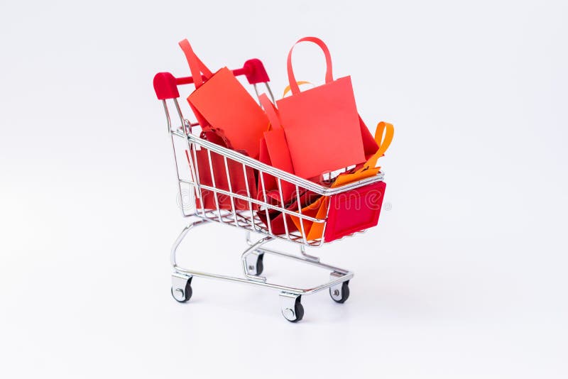 Shopping Bag Full On Shopping Cart On White Background Stock Photo
