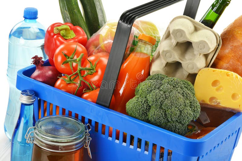 Shopping basket and groceries isolated on white