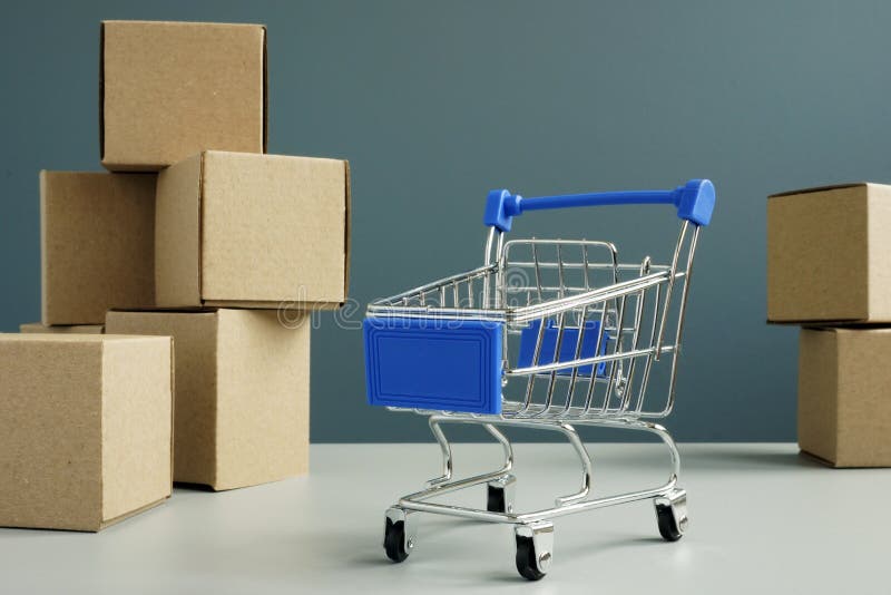 Shopping Card and Cardboard Boxes. Online Shopping and Delivery Stock
