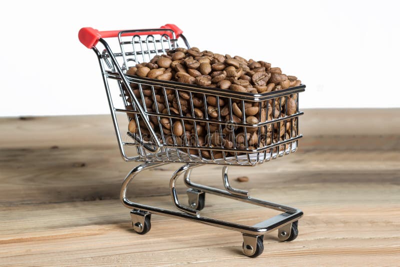 The Shopping Cart With Coffee Beans On Wooden Table Stock Photo Image