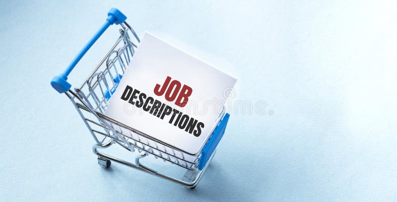 Shopping cart and text JOB DESCRIPTIONS on white paper note list. Shopping list concept on blue background