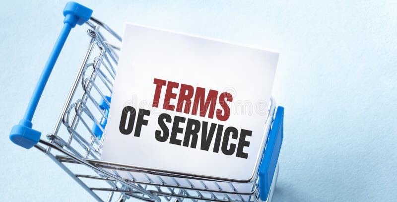 Shopping cart and text TERMS OF SERVICE on white paper note list. Shopping list concept on blue background