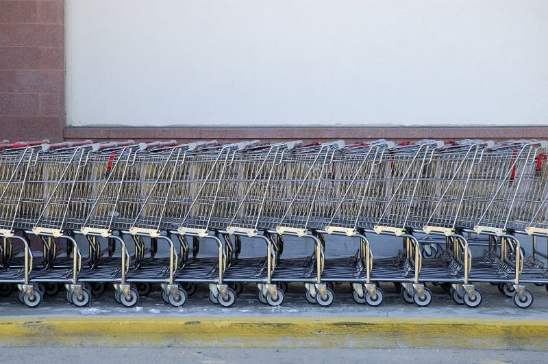 Row of Shopping Carts Outside with Heavy Shadow Stock Photo Image of