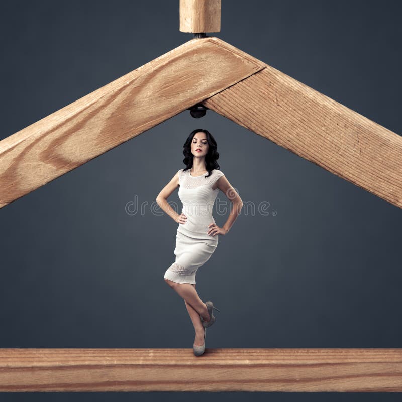 Shopping Concept. Woman And A Wood Hanger