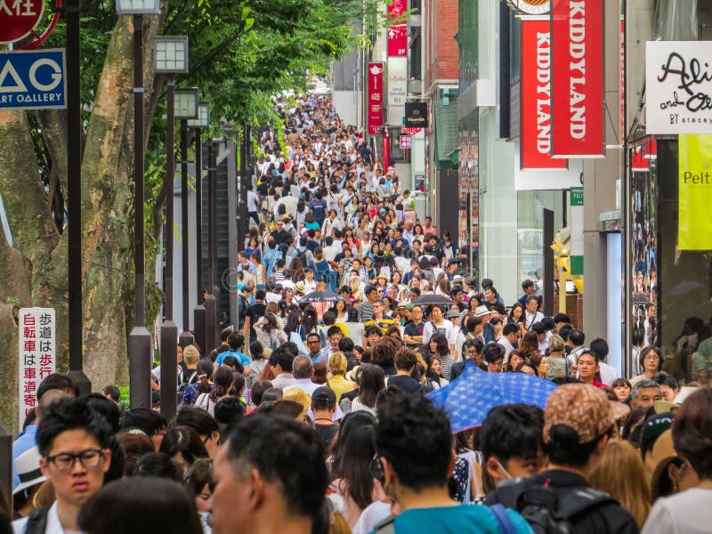 Shopping crowd. Crowd walking in one of the main shopping streets in Tokyo, Japan Shopping crowd. Crowd walking in one of the main shopping streets in Tokyo, Japan