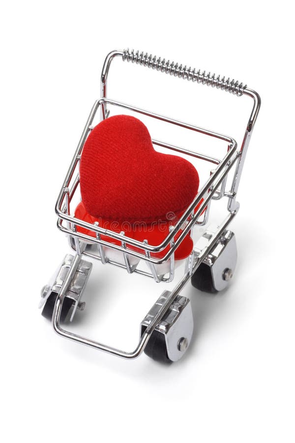 Love heart shape symbol in shopping cart on white background. Love heart shape symbol in shopping cart on white background