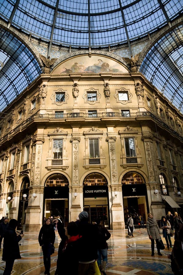 Louis Vuitton shop in Galleria Vittorio Emanuele Milano, Italy. People  entertain themselves staying close to iconic brandsor using as meeting  point Stock Photo - Alamy